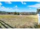 Expansive open land with mature trees, providing a peaceful and picturesque backdrop for this property at 5420 W Goeller W Rd, Columbus, IN 47201