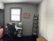 Bedroom featuring a desk, ladder shelf, and neutral decor at 5700 S 100 W, Pendleton, IN 46064