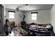 Bedroom with a dark wood floor, rug, bed, and lots of toys for the  at 5700 S 100 W, Pendleton, IN 46064