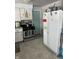 Kitchen with stainless steel range, white refrigerator, and plenty of cabinet space at 5700 S 100 W, Pendleton, IN 46064
