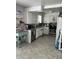 Bright kitchen with white cabinetry, stainless steel appliances, and coffee bar at 5700 S 100 W, Pendleton, IN 46064
