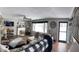 Cozy living room featuring a fireplace, large window, and comfortable seating at 5700 S 100 W, Pendleton, IN 46064