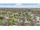 Aerial view of a residential community with lots of green space and trees at 5762 Overcrest Dr, Indianapolis, IN 46237