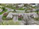 A beautiful aerial view of townhomes featuring attached garages and landscaping at 5762 Overcrest Dr, Indianapolis, IN 46237