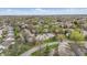 Aerial view featuring homes with mature trees, landscaping, and green spaces at 5762 Overcrest Dr, Indianapolis, IN 46237