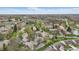 Aerial view of a quiet community with mature trees and multiple houses at 5762 Overcrest Dr, Indianapolis, IN 46237