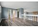 This bedroom leads to a walk-in closet and ensuite bathroom, and overlooks the living area at 5762 Overcrest Dr, Indianapolis, IN 46237