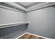 This walk-in closet has lots of space and built-in shelving for storage at 5762 Overcrest Dr, Indianapolis, IN 46237