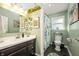 Stylish bathroom features updated vanity, modern fixtures, and a decorative shower curtain at 6225 Indianola Ave, Indianapolis, IN 46220