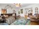 Inviting living room with hardwood floors, ample seating, and natural light, perfect for Gathering gatherings at 6225 Indianola Ave, Indianapolis, IN 46220