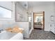 Bright bathroom featuring a soaking tub and a marble tiled shower with glass surround at 6459 Canak Dr, Avon, IN 46123