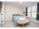 Bedroom with neutral walls and a large window providing plenty of natural light at 6459 Canak Dr, Avon, IN 46123