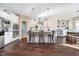 Modern kitchen featuring white cabinets, stainless steel appliances, and a breakfast bar at 6459 Canak Dr, Avon, IN 46123