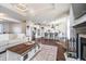 Open concept kitchen with stainless steel appliances, a center island, and a breakfast bar at 6459 Canak Dr, Avon, IN 46123