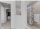 Clean bathroom with a tiled shower, glass door, and adjacent walk-in closet at 6922 Kara Ln, Brownsburg, IN 46112
