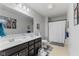 Bright bathroom featuring a double sink vanity, large mirror, and combined shower and tub at 6922 Kara Ln, Brownsburg, IN 46112