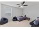 Cozy bedroom with a ceiling fan, natural light, and neutral tones at 6922 Kara Ln, Brownsburg, IN 46112