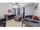 Shared bedroom featuring two beds, a comfy chair, and colorful decorations at 6922 Kara Ln, Brownsburg, IN 46112