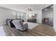 Stylish living room featuring a sleek fireplace, plush seating, and a large TV at 6922 Kara Ln, Brownsburg, IN 46112