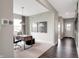 Well-lit study with desk, chair, ottoman, large window, and stylish decor at 7397 Standish Ln, Avon, IN 46123