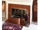 The fireplace features a tile surround and traditional design at 7682 Micawber Ct, Indianapolis, IN 46256