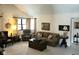 Comfortable living room featuring large window and a relaxing atmosphere with neutral tones at 7682 Micawber Ct, Indianapolis, IN 46256