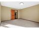 Bedroom with carpet, and an open closet at 8329 Hill Gail Dr, Indianapolis, IN 46217