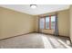 Bedroom featuring natural light, carpet, and window with curtains at 8329 Hill Gail Dr, Indianapolis, IN 46217