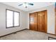 Bedroom featuring carpet, closet, and window providing natural light at 8329 Hill Gail Dr, Indianapolis, IN 46217