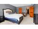 Main bedroom with neutral carpet, natural light, and ensuite bathroom at 8329 Hill Gail Dr, Indianapolis, IN 46217