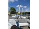 Stylish outdoor lounge area with comfortable seating, perfect for relaxing by the lake at 8329 Hill Gail Dr, Indianapolis, IN 46217