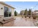 View of the back patio with stamped concrete, string lights, and sliding glass door to the home at 10264 Normandy Way, Fishers, IN 46040