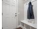 Mudroom featuring a coat rack and storage bench at 10264 Normandy Way, Fishers, IN 46040