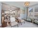 Bright sunroom featuring hardwood floors, comfortable seating, and natural light at 10264 Normandy Way, Fishers, IN 46040