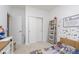 bedroom featuring a closet, window, bed with printed bedding, and toy decor at 1030 Macoun Dr, Westfield, IN 46074