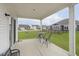 Enjoy backyard views from this covered patio with outdoor seating and neighborhood view at 1030 Macoun Dr, Westfield, IN 46074
