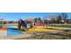 Community playground features play equipment, offering outdoor fun and social interaction at 1030 Macoun Dr, Westfield, IN 46074