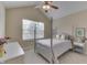 Bedroom with cathedral ceiling and large window at 10329 Gateway Dr, Indianapolis, IN 46234