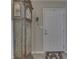 Entryway with a grandfather clock, tile flooring, and a white door at 10329 Gateway Dr, Indianapolis, IN 46234