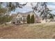 Charming single story home featuring a combination of tan siding and red brick accents at 10329 Gateway Dr, Indianapolis, IN 46234
