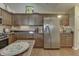 Spacious kitchen featuring stainless steel appliances, granite counters, and abundant storage at 10329 Gateway Dr, Indianapolis, IN 46234