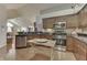 Bright kitchen features stainless appliances, granite counters, and an adjacent eating area at 10329 Gateway Dr, Indianapolis, IN 46234