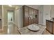 Well-appointed kitchen with ample cabinet space and convenient access to hallway and appliances at 10329 Gateway Dr, Indianapolis, IN 46234