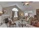 Comfortable living room with a fireplace, ample seating, and large window at 10329 Gateway Dr, Indianapolis, IN 46234