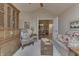 Inviting living room with a decorative cabinet and comfortable, patterned furniture at 10329 Gateway Dr, Indianapolis, IN 46234