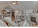 Inviting living room featuring a fireplace, hardwood floors, and a large window at 10329 Gateway Dr, Indianapolis, IN 46234