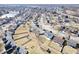 An aerial view of a neighborhood with a pond and tree-lined yards at 10373 Cerulean Dr, Noblesville, IN 46060
