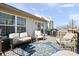 Cozy outdoor deck featuring comfortable seating, a stylish rug, and a grilling area perfect for entertaining at 10373 Cerulean Dr, Noblesville, IN 46060