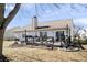 A spacious backyard deck with sliding glass doors offers a serene outdoor living space at 10373 Cerulean Dr, Noblesville, IN 46060