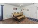 Dining area with modern table, chairs, and bench seating on hardwood floors at 10613 Glenayr Dr, Camby, IN 46113